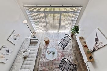 Overhead view of living area with vertical blinds